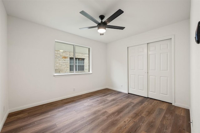 608 Haleys Cv, Leander, TX 78641 - unfurnished bedroom featuring wood finished floors, a closet, and a ceiling fan