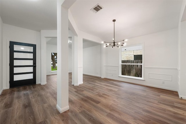 608 Haleys Cv, Leander, TX 78641 - entryway featuring a chandelier and wood finished floors