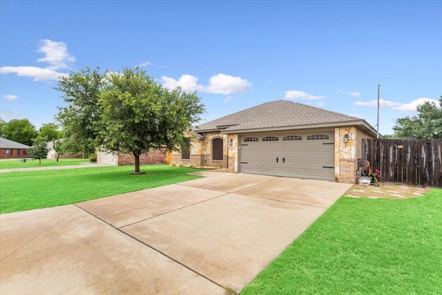 5012 Jeanine Dr, Temple, TX 76502 - view of front of home featuring concrete driveway, an attached garage, and stone siding