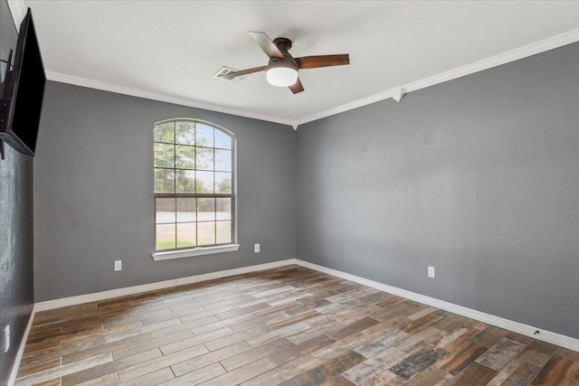 5012 Jeanine Dr, Temple, TX 76502 - spare room featuring a ceiling fan, wood finished floors, and crown molding
