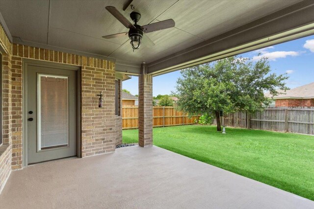 5012 Jeanine Dr, Temple, TX 76502 - fenced backyard with a ceiling fan and a patio