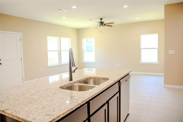 2220 Mc Arthur Ave, Kingsland, TX 78639 - kitchen featuring an island with sink, a ceiling fan, stainless steel dishwasher, plenty of natural light, and recessed lighting