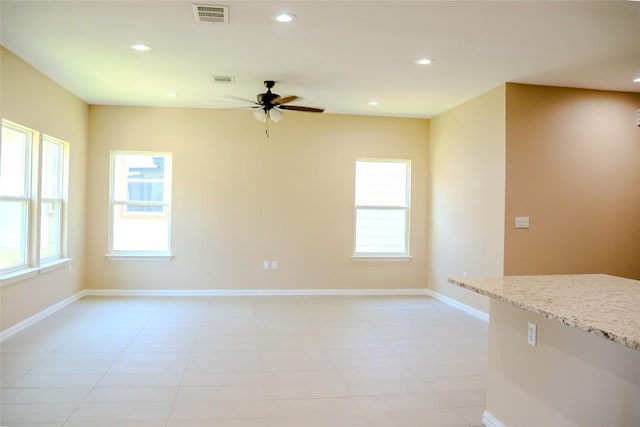 2220 Mc Arthur Ave, Kingsland, TX 78639 - spare room with a ceiling fan, recessed lighting, and light tile patterned floors