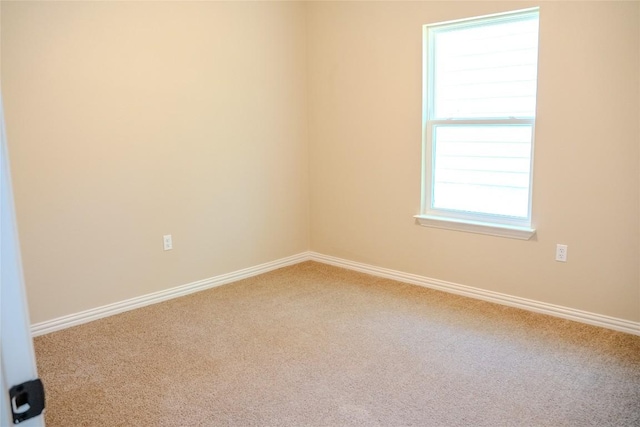2220 Mc Arthur Ave, Kingsland, TX 78639 - carpeted empty room with baseboards