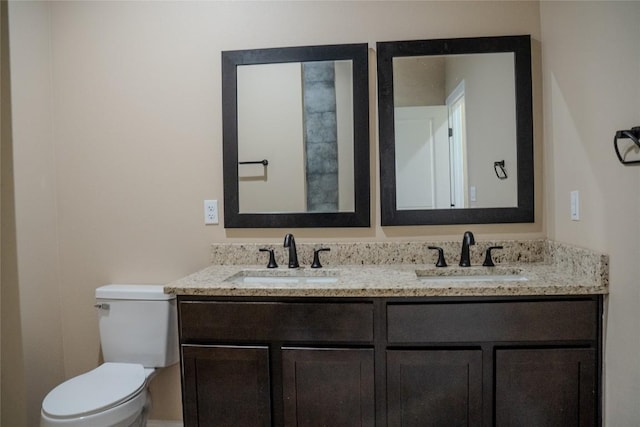 2220 Mc Arthur Ave, Kingsland, TX 78639 - bathroom featuring toilet and double vanity
