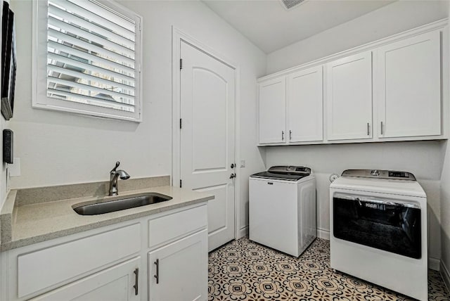 120 Delfino Pl, Horseshoe Bay, TX 78657 - laundry area with washer and dryer and cabinet space