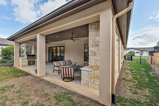 120 Delfino Pl, Horseshoe Bay, TX 78657 - view of patio / terrace featuring exterior kitchen, a ceiling fan, and outdoor lounge area