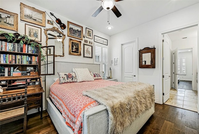 120 Delfino Pl, Horseshoe Bay, TX 78657 - bedroom with hardwood / wood-style floors and a ceiling fan
