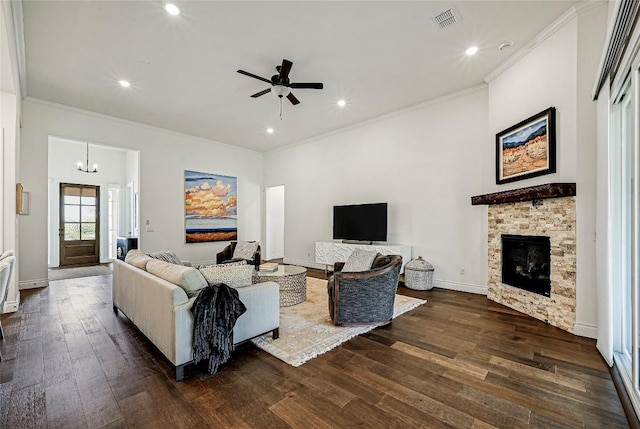 120 Delfino Pl, Horseshoe Bay, TX 78657 - living room with dark wood-style flooring, a fireplace, ornamental molding, ceiling fan, and recessed lighting