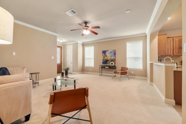 11900 Timber Heights Dr, Austin, TX 78754 - living room featuring light colored carpet, crown molding, and ceiling fan