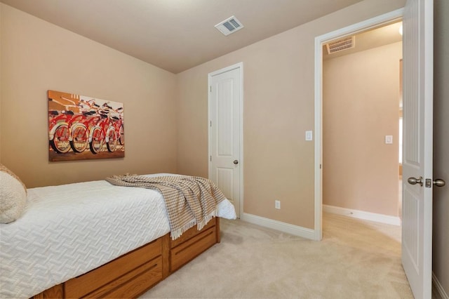 11900 Timber Heights Dr, Austin, TX 78754 - bedroom featuring baseboards and light colored carpet