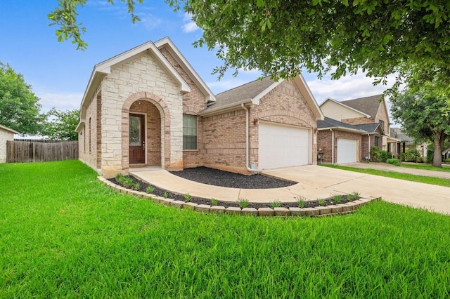 11900 Timber Heights Dr, Austin, TX 78754 - view of front of property with a garage, concrete driveway, brick siding, and stone siding