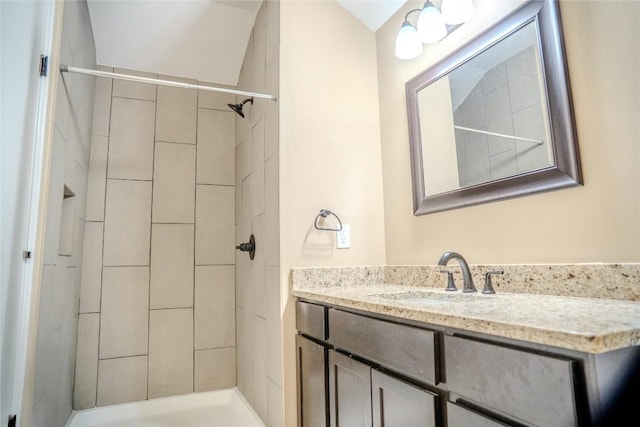 2182 Mcarthur Ave, Kingsland, TX 78639 - bathroom featuring vanity and tiled shower