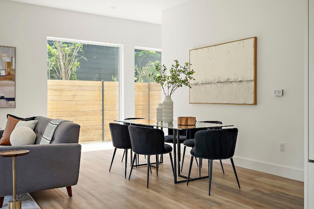 5507 Manor Rd Unit B, Austin, TX 78723 - dining room featuring wood finished floors