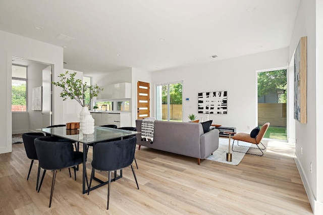 5507 Manor Rd Unit B, Austin, TX 78723 - dining room with light wood-style flooring and baseboards