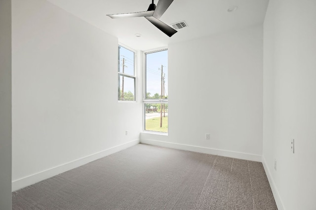 5507 Manor Rd Unit B, Austin, TX 78723 - empty room featuring a ceiling fan and carpet floors