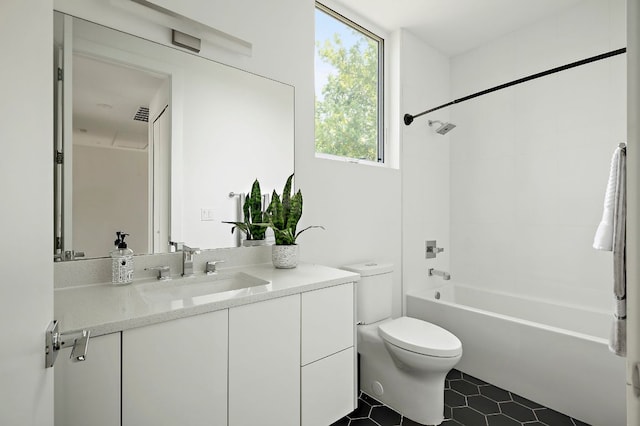 5507 Manor Rd Unit B, Austin, TX 78723 - bathroom with vanity, shower / washtub combination, and tile patterned floors