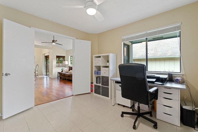 3008 Siskin Dr, Austin, TX 78745 - home office with a ceiling fan and plenty of natural light