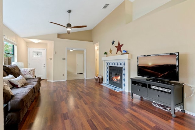 3008 Siskin Dr, Austin, TX 78745 - living room featuring wood finished floors, ceiling fan, vaulted ceiling, and a fireplace