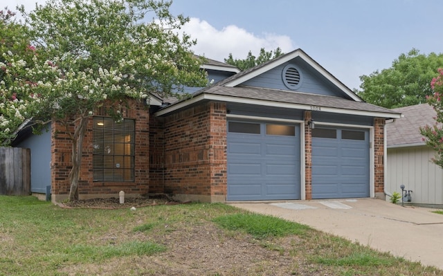 3008 Siskin Dr, Austin, TX 78745 - view of front of property featuring brick siding, concrete driveway, a shingled roof, and an attached garage