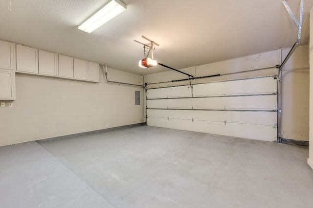 146 Double Eagle Dr, Austin, TX 78738 - garage featuring electric panel and a garage door opener