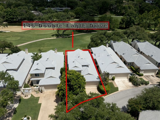 146 Double Eagle Dr, Austin, TX 78738 - aerial view of residential area with property boundaries highlighted and a golf club