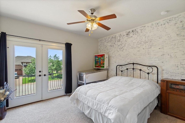 1915 Los Santos Dr, San Marcos, TX 78666 - bedroom with french doors, access to outside, carpet floors, and ceiling fan
