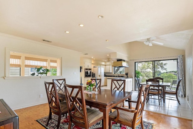 6033 Mount Bonnell Cv, Austin, TX 78731 - dining room with plenty of natural light, a ceiling fan, recessed lighting, crown molding, and vaulted ceiling