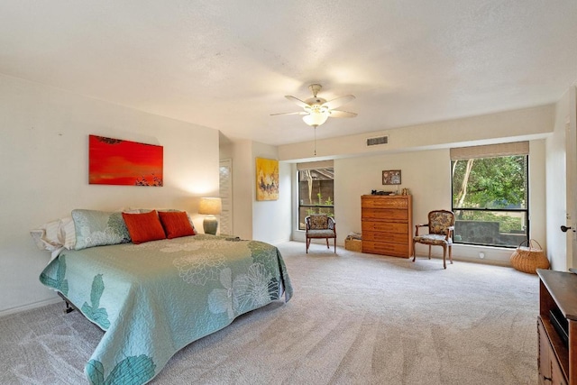 6033 Mount Bonnell Cv, Austin, TX 78731 - bedroom with carpet floors and a ceiling fan