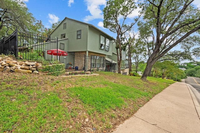 6033 Mount Bonnell Cv, Austin, TX 78731 - view of home's exterior featuring brick siding