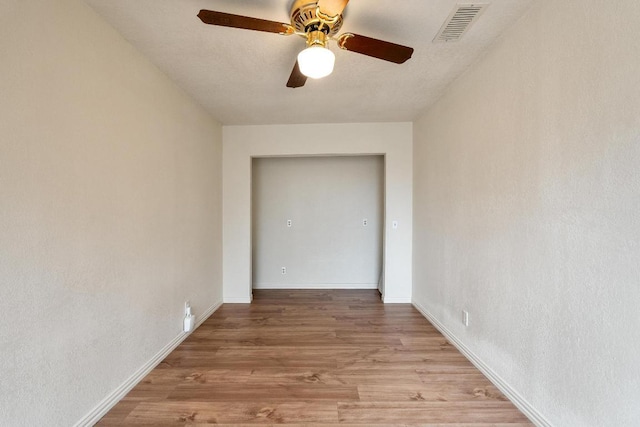 6033 Mount Bonnell Cv, Austin, TX 78731 - unfurnished room featuring ceiling fan and light wood-style flooring