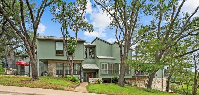 6033 Mount Bonnell Cv, Austin, TX 78731 - view of front of property with a standing seam roof and a metal roof