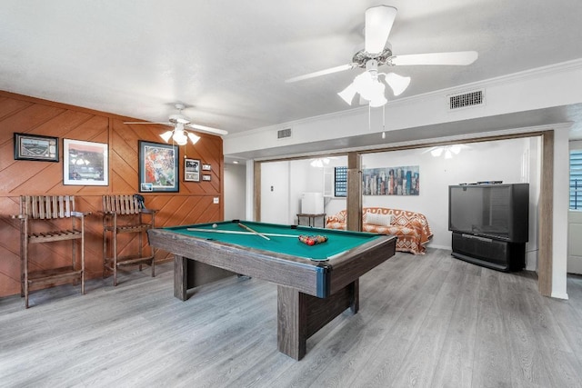 6033 Mount Bonnell Cv, Austin, TX 78731 - game room with wood finished floors, billiards, a ceiling fan, crown molding, and wooden walls