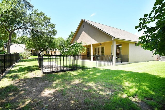 101 Bass St, Georgetown, TX 78633 - fenced yard with ceiling fan and a patio