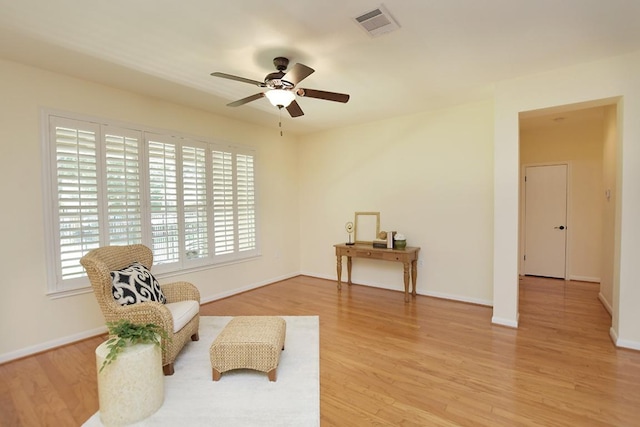 101 Bass St, Georgetown, TX 78633 - living area featuring ceiling fan and light wood-style flooring