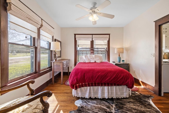 306 S Market St, Flatonia, TX 78941 - bedroom featuring wood finished floors and ceiling fan