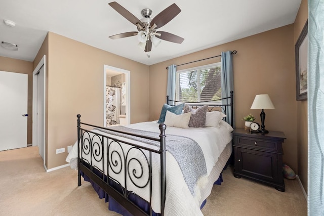 8604 Granada Hills Dr, Austin, TX 78737 - bedroom featuring light colored carpet, connected bathroom, and ceiling fan