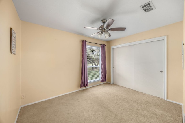 8604 Granada Hills Dr, Austin, TX 78737 - unfurnished bedroom featuring carpet floors, a closet, and ceiling fan