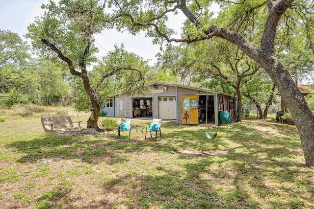 8604 Granada Hills Dr, Austin, TX 78737 - view of grassy yard featuring an outdoor structure