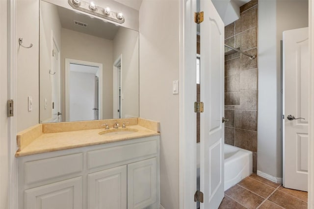 27 Autumn Oaks Dr, The Hills, TX 78738 - bathroom with vanity, tile patterned flooring, and shower / tub combination