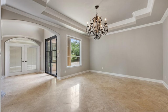 27 Autumn Oaks Dr, The Hills, TX 78738 - unfurnished room with french doors, a chandelier, arched walkways, ornamental molding, and a tray ceiling