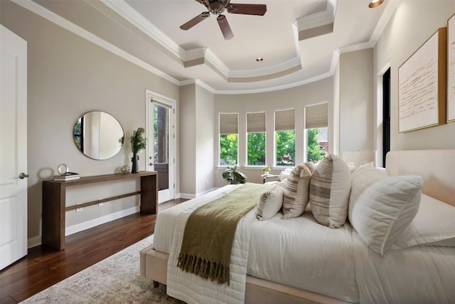 27 Autumn Oaks Dr, The Hills, TX 78738 - bedroom featuring a tray ceiling, wood finished floors, crown molding, and ceiling fan