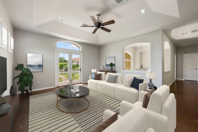 27 Autumn Oaks Dr, The Hills, TX 78738 - living area with a raised ceiling, wood finished floors, a ceiling fan, recessed lighting, and attic access