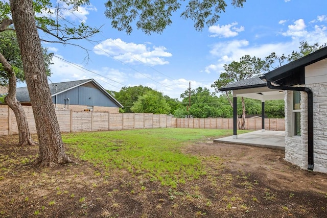11615 February Dr, Austin, TX 78753 - fenced backyard featuring a patio area