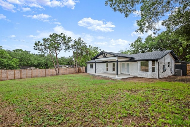 11615 February Dr, Austin, TX 78753 - back of house with a fenced backyard and a patio