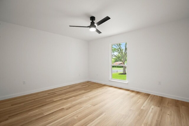11615 February Dr, Austin, TX 78753 - empty room with light wood finished floors and ceiling fan