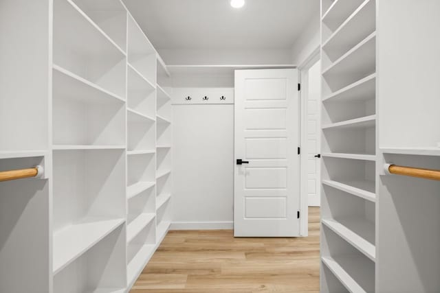 11615 February Dr, Austin, TX 78753 - walk in closet with light wood-style flooring