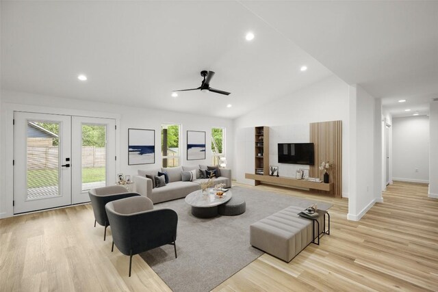 11615 February Dr, Austin, TX 78753 - living area with a ceiling fan, light wood-style floors, recessed lighting, french doors, and vaulted ceiling