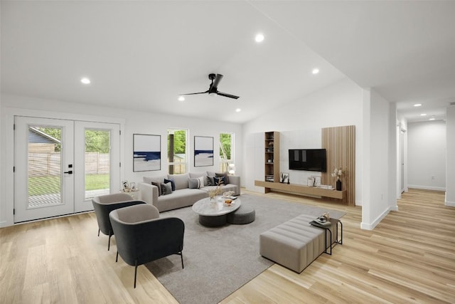 11615 February Dr, Austin, TX 78753 - living area with a ceiling fan, light wood finished floors, recessed lighting, lofted ceiling, and french doors
