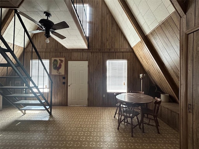 410 County Road 433rd Rd, Mullin, TX 76864 - dining area featuring wood walls, ceiling fan, and high vaulted ceiling